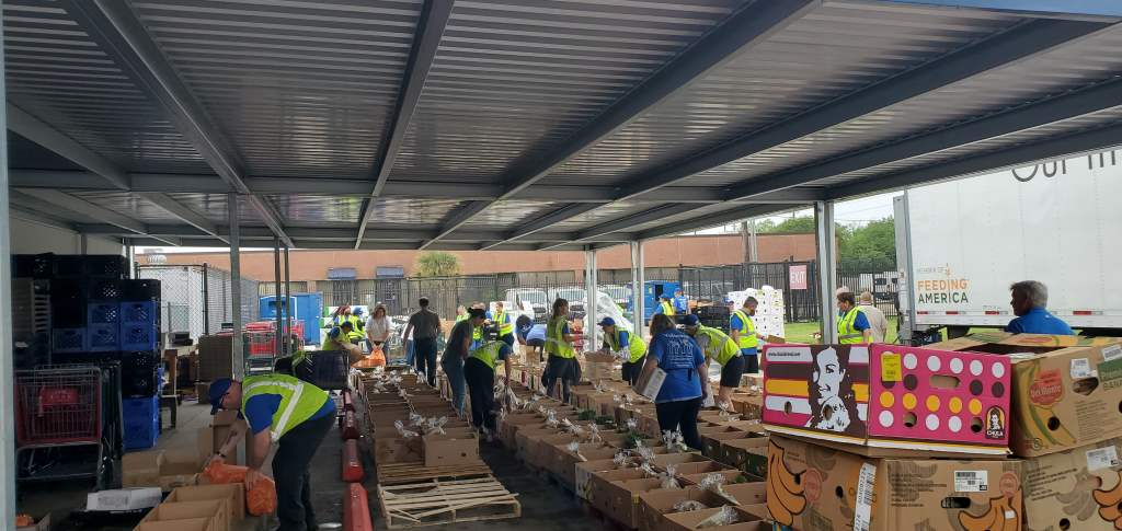 Family receives groceries at South Houston Community Center pantry.