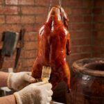 Peking Duck with crisp skin and thin pancakes